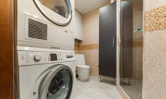 Piastrella Pixel in bagno con lavatrice e doccia