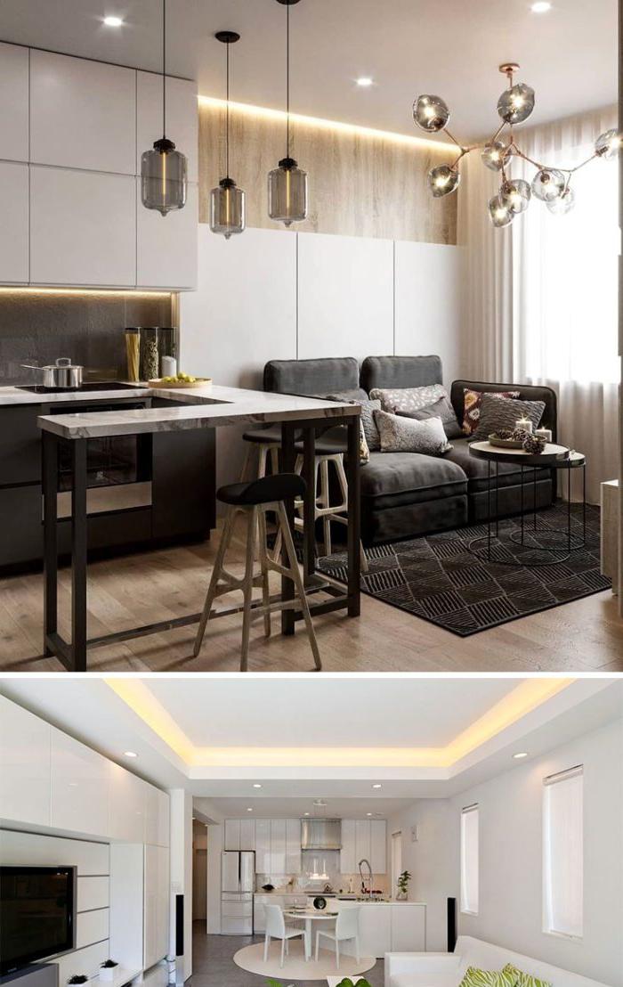 La combinazione di bianco e legno negli interni della cucina-soggiorno in stile minimalista