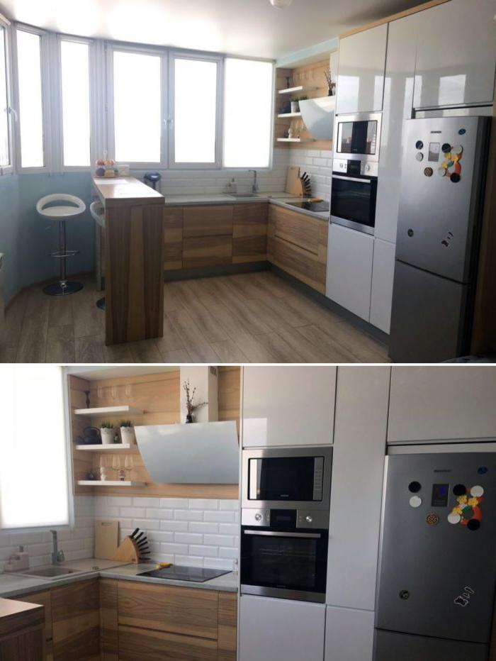frigorifero a libera installazione integrato nella cucina a forma di U.